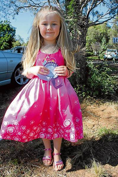  SO CUTE: five-year-old Lexie Blundell, who goes to EA Southee Public School, won the Little Miss competition at Stockinbingal Village Fair on Sunday, and didn’t she look gorgeous. 