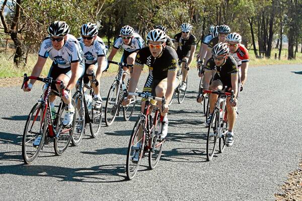 WORKING WELL: it was the ability of the 7.00 minute bunch to work as one that proved vital to them dominating the placings in Sunday’s Stock Fair race. The bunch, which included Coota’s Brendan Forsyth and Ken Clarke, is pictured during the early stages, with eventual winner Andrew Collins from the Vikings Club in Canberra on left (red handlebars).