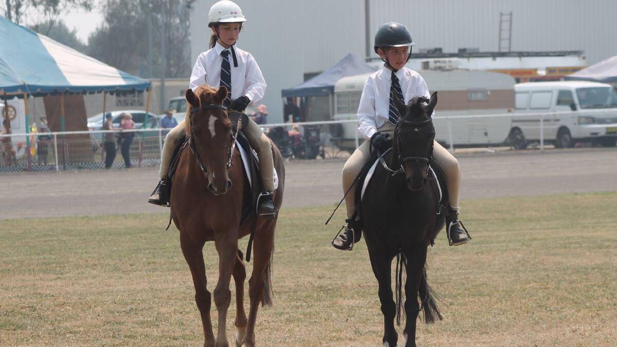 FAMILY DAY: Meg Roberts and brother Joseph took part in the horse events section of the Cootamundra Show on Saturday.  Photo: Melinda Chambers