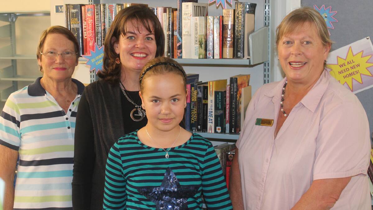  SPECIAL DONATION: pictured (from left) are Rene Horsburgh, Penny Howse, Caitlin Horsborough and Leanne Jones at Cootamundra Library on Friday afternoon. Caitlin donated the book ‘Fighting Blind’ which was written by her uncle Shane.