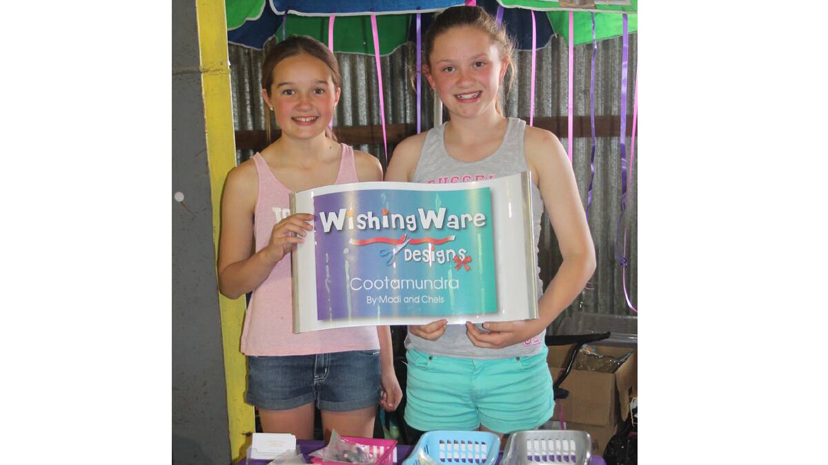 GREAT WORK GIRLS: Young entrepreneurs Madison Wishart (left) and Chelsie Manwaring with their beautiful range of hair accessories. The girls have their own business called WishingWare Designs.  Photo: Melinda Chambers