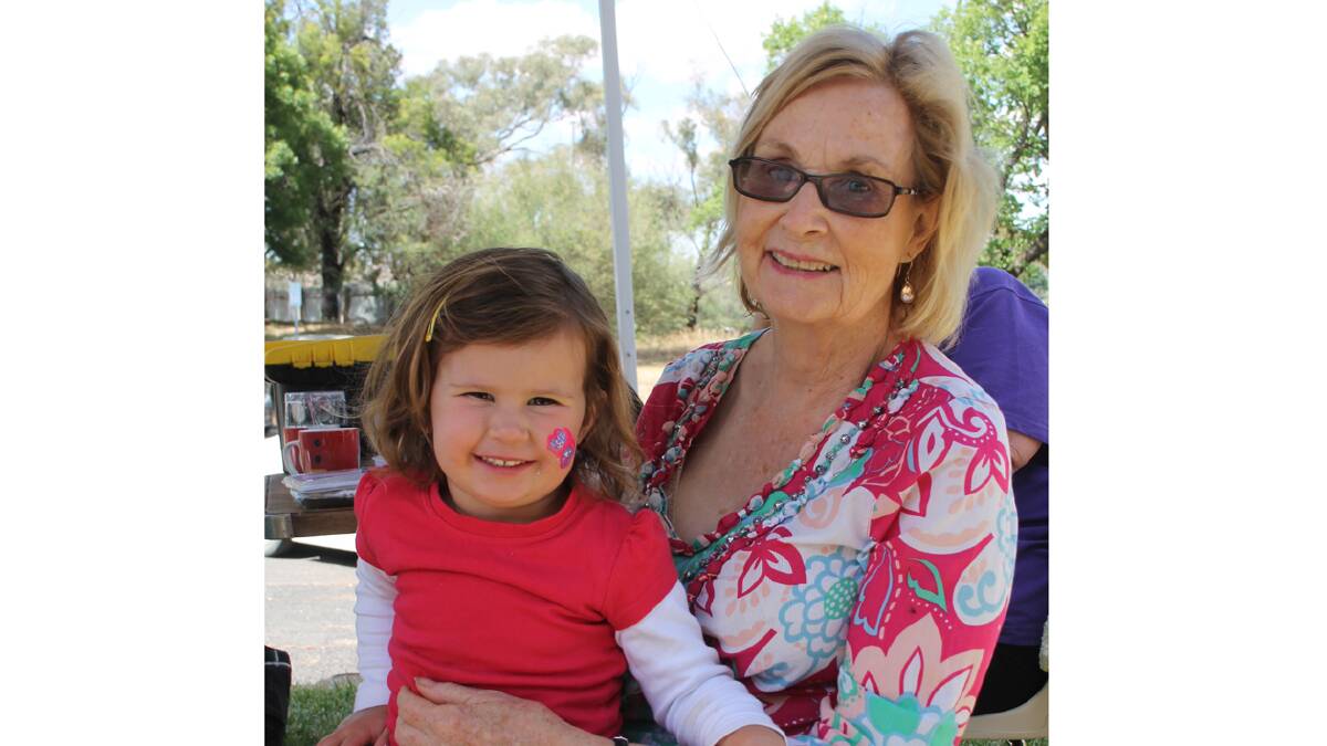 AT THE FAIR: Pictured at the Wallendbeen Red Cross Christmas Fair held on Saturday last were Sandra Berryman with her very cute granddaughter Lily. PHOTOS:  Melinda Chambers