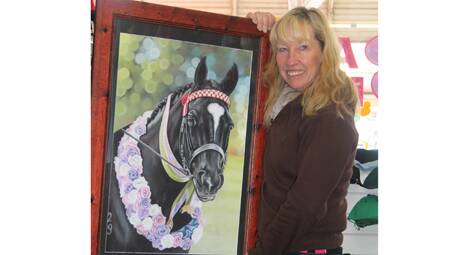 IMPRESSIVE PORTRAIT We could not resist taking this photo of Jo Chester and her beloved horse Grace. Grace has won many a ribbon with Jo riding her at the Sydney Royal Easter Show, the Canberra Show and of course at the Cootamundra Show. AND this most impressive portrait done in pastels was given to Jo by her darling daughters for her birthday which was Wednesday last.
