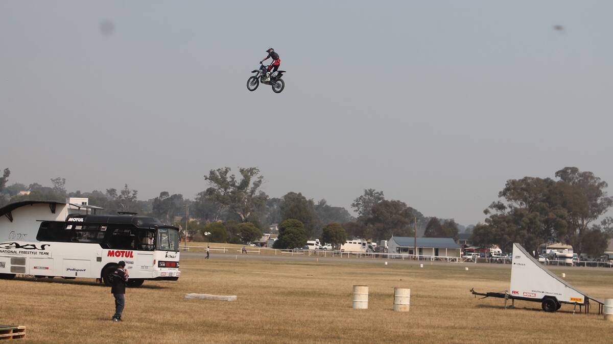  IMPRESSIVE: The Kaos Freestyle Motocross crew were a hit at the Coota Show on Saturday impressing the crowd with their varied stunts. 