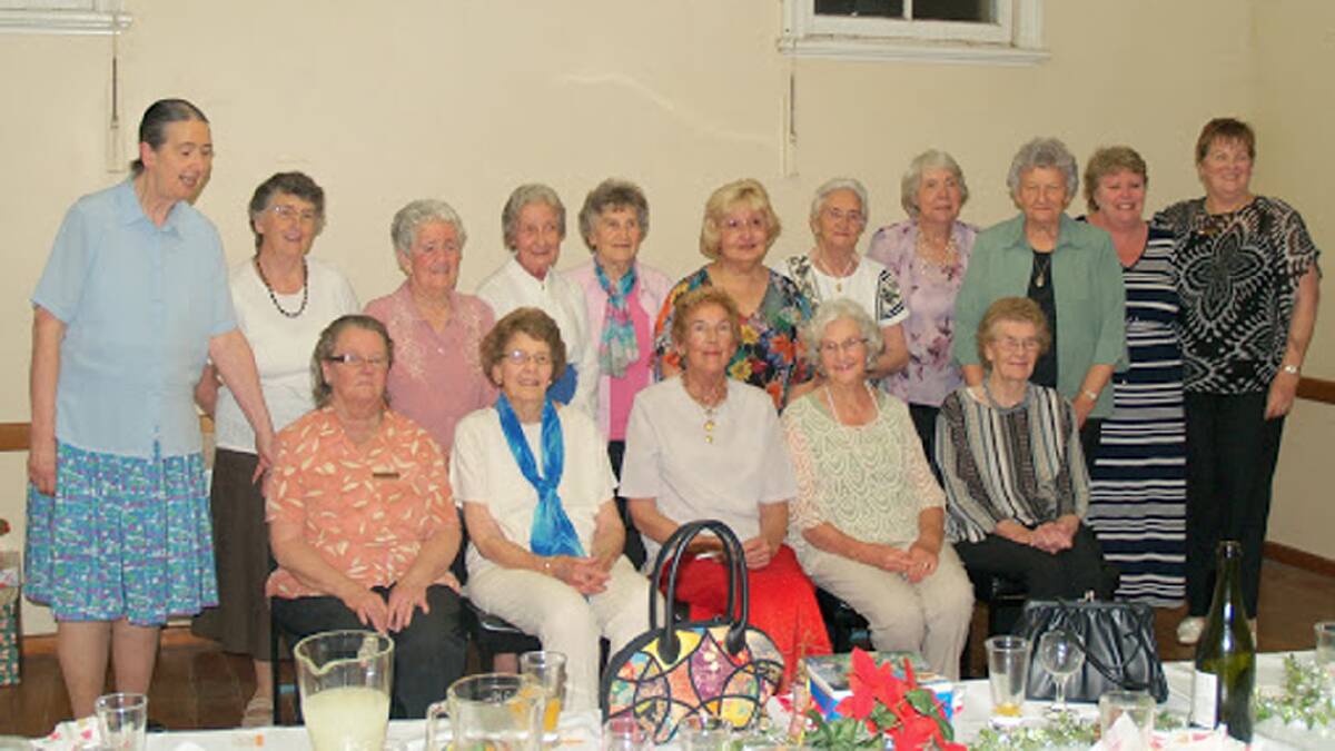 END OF AN ERA: Pictured right shows the group of Masonic wives and widows who attended the final gathering of Lodge Cootamundra St John. No 124 on Thursday, November 21, 2013.