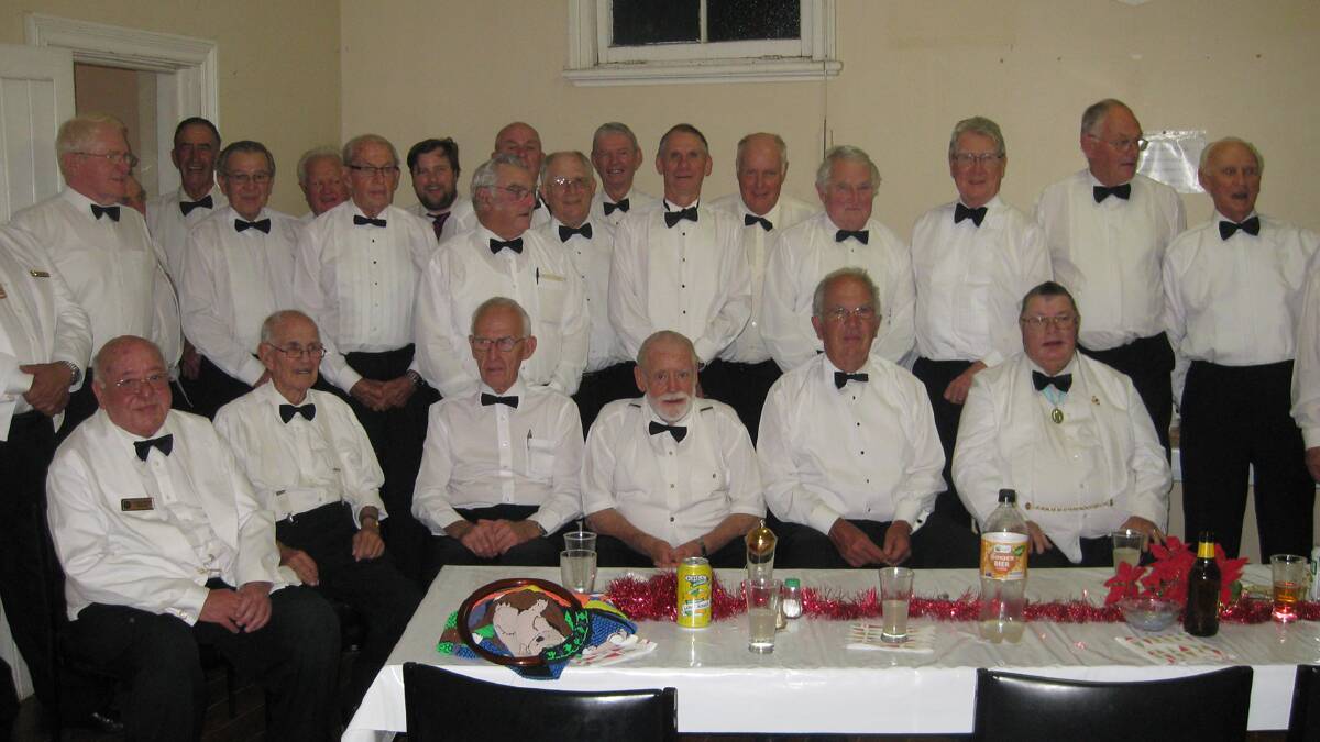 SAYING GOODBYE:Pictured Members of Cootamundra Masonic Lodge No 124 assembled with visitors prior to their last meeting on Thursday, November 21, 2013.