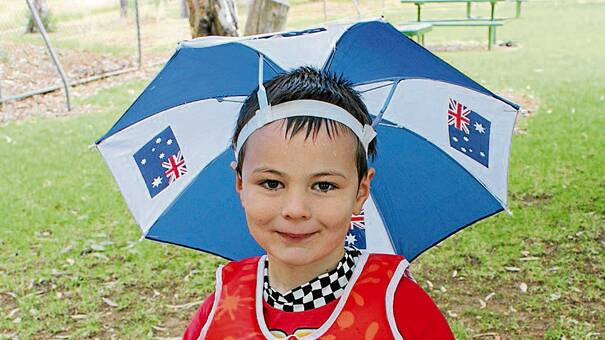  IN THE SPIRIT: Kyle Collins of Cootamundra, who was five last Australia Day, certainly got into the Australia Day at the town pool party last year. 