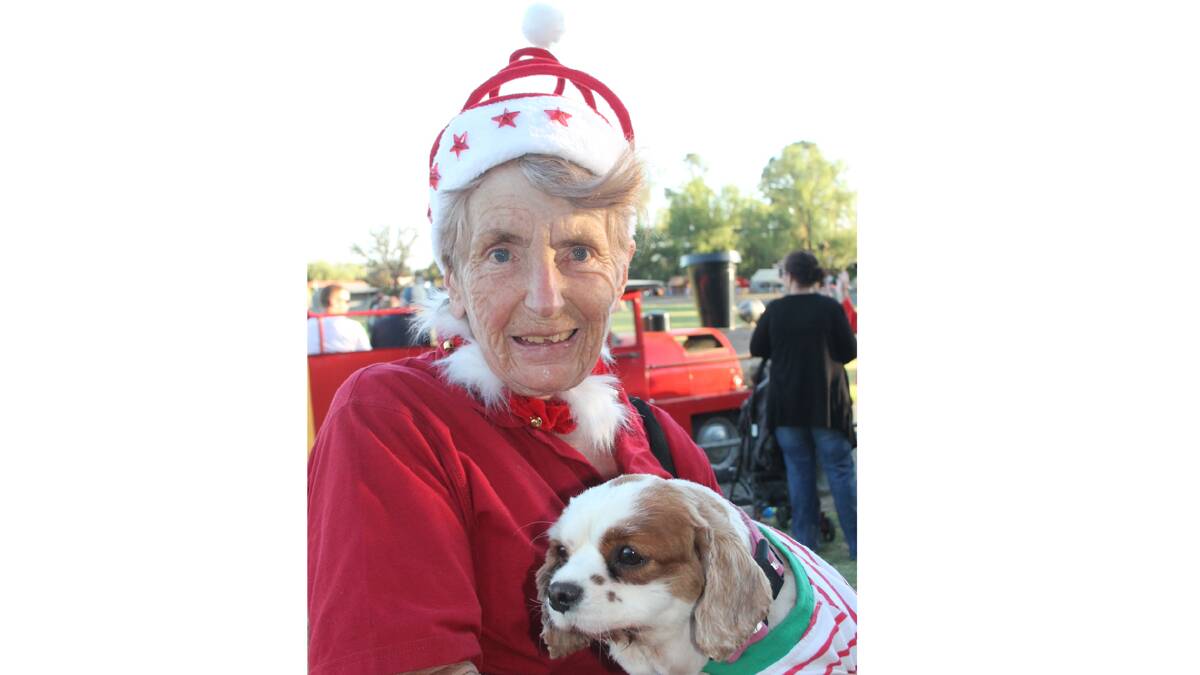  HAPPY DAYS: Pictured with her pampered pooch Tammy Rose at the Cootamundra Lions Christmas Fair on Saturday night was Lyn Joss.