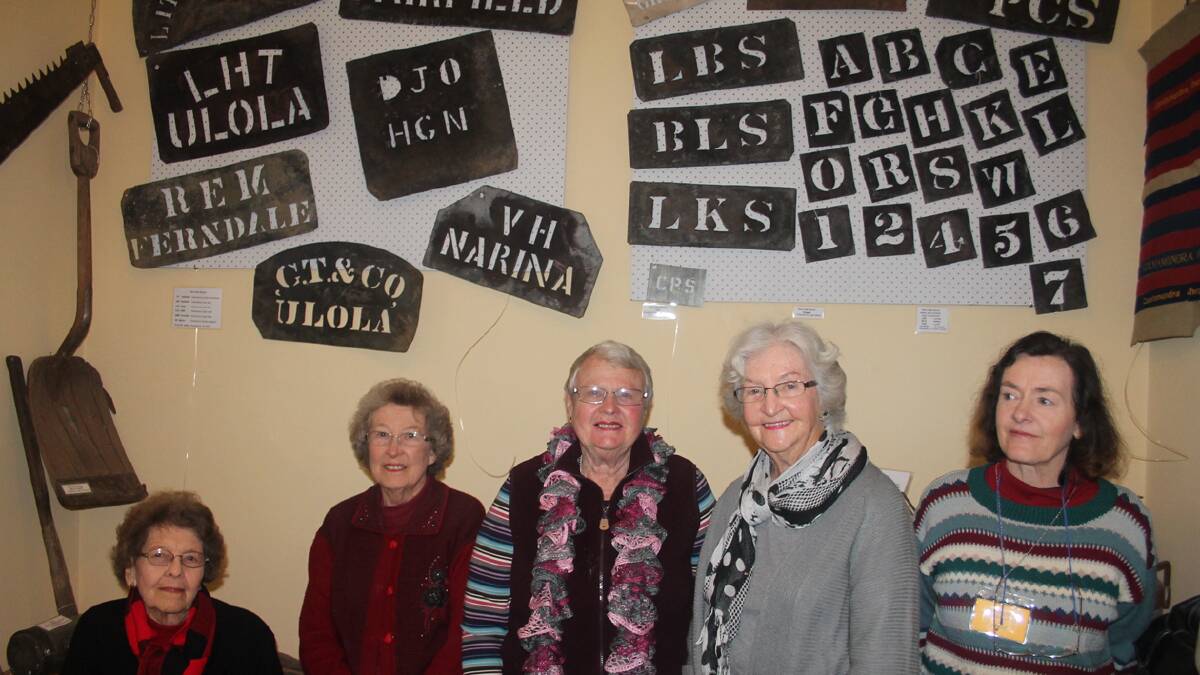  VOLUNTEERING: Pictured enjoying the Cootamundra Heritage Centre’s 12th birthday celebrations were volunteers (from left) June Ward, Tresna Ward, Margaret Larsen, Dot Woodman and Janis Miller. The volunteers are pictured in front of the new agricultural display. The centre is asking for wool bale stencils for their display. Photo: Melinda Chambers