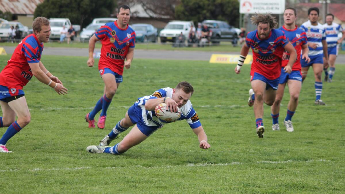  FOUR TRY HERO: pictured is Matt Forsyth scoring one of his four tries in the Bulldogs game against the Wagga Kangaroos on Sunday. The Bulldogs won the game 36-30 to go into this weekend’s semi final. Photo: Melinda Chambers