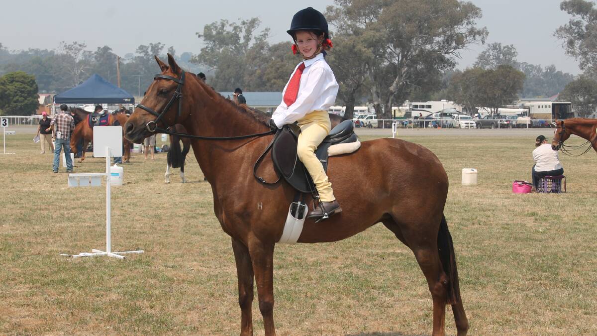 PROUD: Cootamundra’s Pip Crawford is pictured on her pony during the Cootamundra Show on the weekend.