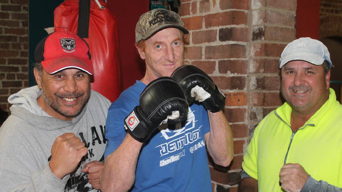 READY TO ROLL: pictured (from left) are Cootamundra Bulldogs coach Mark Elia, amateur boxer Red Hoey and Bulldogs President Wayne Berkrey. The Cootamundra Boxing night will take place on December 14 at Cootamundra Town Hall. 
