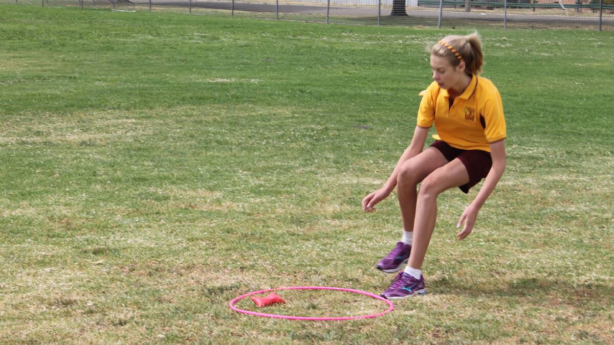 GETTING THEIR FIRST: pictured is EA Southee student Katie Stephens playing bean tag as part of a specially made mini Olympics organised by students at Cootamundra High School.