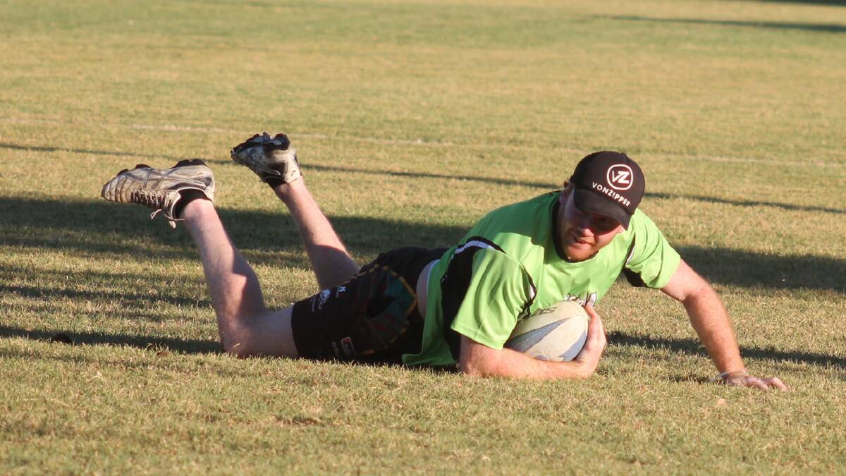  TRY TIME: pictured is Aaron Byrne scoring a try for his side in last Friday’s round of games.   Photo: Melinda Chambers.