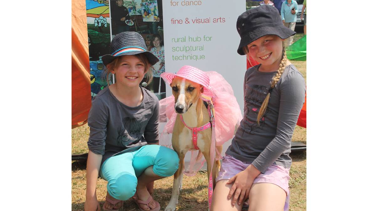  BEST DRESSED: Sisters Frankie and Piper Scott are pictured with their whippet Agatha. Agatha won the best dressed pet at the Cootamundra Show Pet Show.