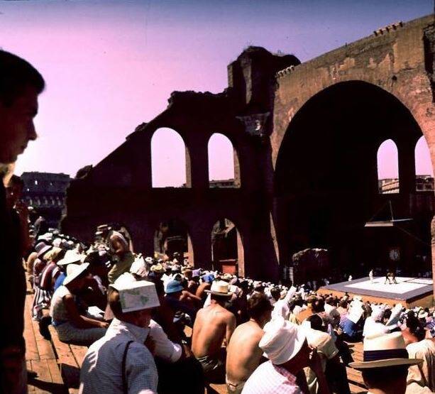 Watching the wrestling at the 1960 Rome Olympics, the first to be televised. Watching the wrestling at the 1960 Rome Olympics, the first to be televised.