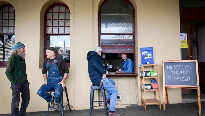 The Tortoise Espresso coffee window in Castlemaine, Victoria with customers waiting patiently. Picture by Brendan McCarthy