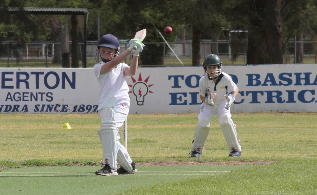 JUNIORS: While the seniors battled it out, the Cootamundra juniors also took to the pitch. Henry Hazlett is pictured playing his shot. Photo: KELLY MANWARING