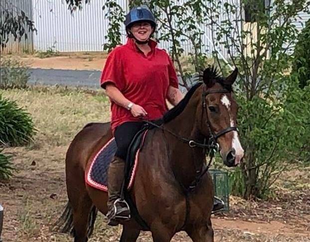 Journalist Rebecca Hewson out on a trail ride. Photo: Charmaine New