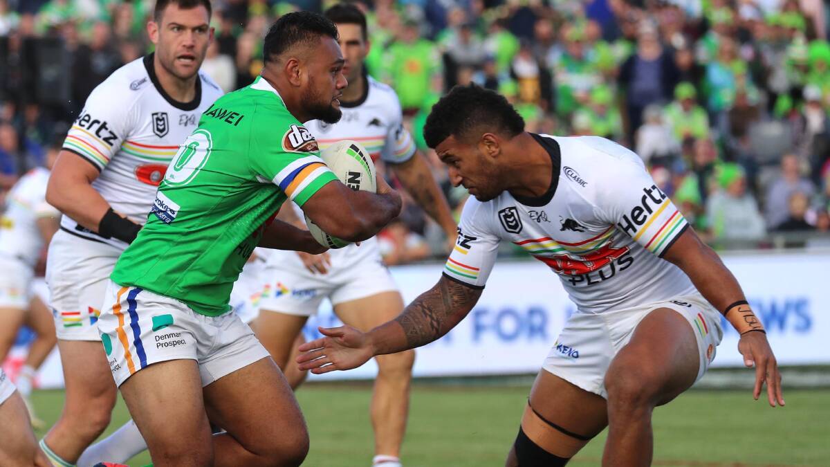 RIVERINA BOUND: Canberra's Dunamis Lui and Penrith's Viliame Kikau clash during last year's NRL match-up in Wagga. Picture: Les Smith 