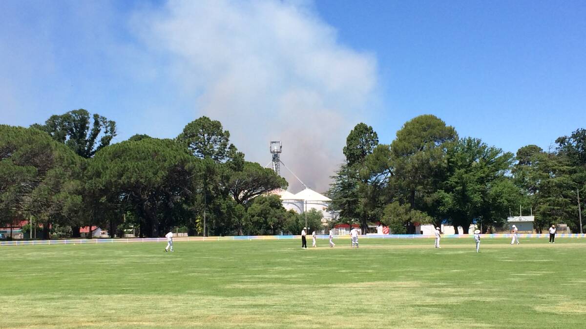 The fire burns over Albert Park where the Bradman Letter challenge was taking place. 