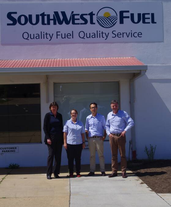 Staff of SouthWest Fuel outside their temporary 'home' at 88 Parker Street, Cootamundra. Picture: Jody Potts