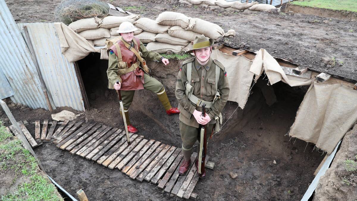 NO MAN'S LAND: John Morthen and Daniel Papuga explore the trenches in Gundagai. Picture: Emma Hillier
