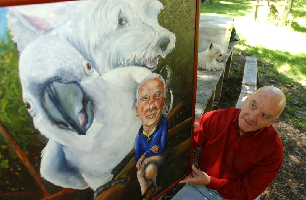 Peter Batey with a portrait of himself, Bald Archy judge Maude the cockatoo and juror Margaret the dog, in 2002. 