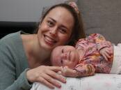 Horror pregnancy: Corrimal mother Tara Burrows with her six-week-old daughter Florence, who was born perfectly healthy after Tara suffered from Hyperemesis Gravidarum in her pregnancy. Picture: Robert Peet.