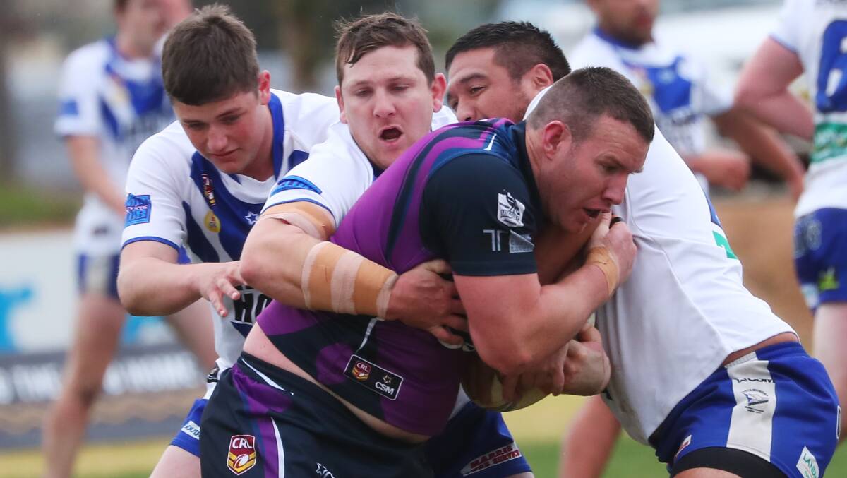 CHARGING AHEAD: Hayden Jeans storms into the Cootamundra defensive line during Southcity's win at Harris Park on Sunday. Picture: Emma Hillier