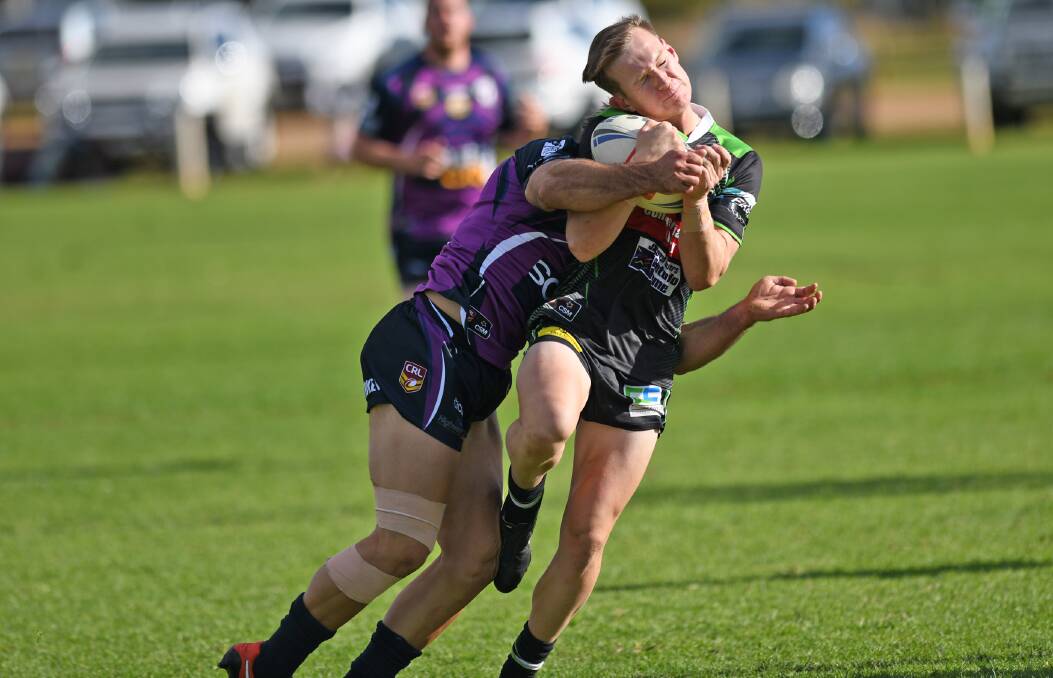 James Girdler being crunched by Nathan Rose earlier this season.