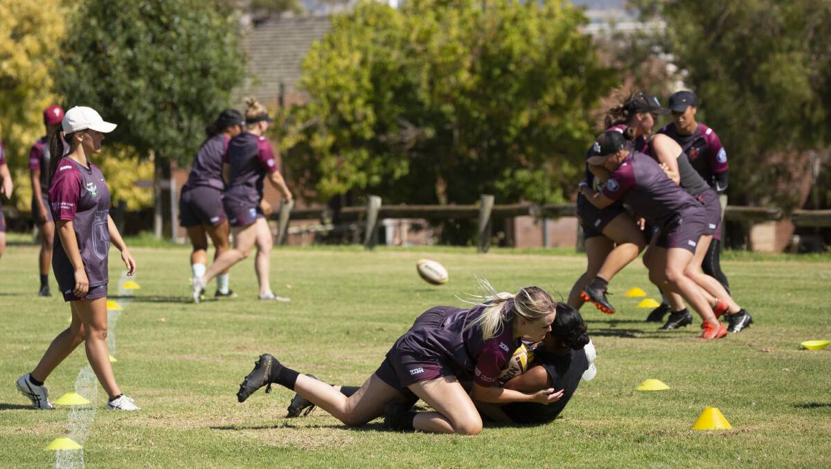 NEW CHALLENGE: Monique Bullock is tackled during Riverina's women's rep training at Beres Ellwood Oval on Saturday. She is one of the new faces in the team for the Country Championships. Picture: Madeline Begley