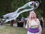 ART ON DISPLAY: Wagga bubble artist Amber Murrary from Tailfeather Art at Tumbafest 2022. Picture: Madeline Begley 