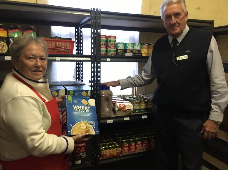 Cootamundra Red Cross Co-Ordinator Helen Eccleston and CGRC deputy mayor Cr Dennis Palmer at the opening of the Red Cross approved Food Bank service on Friday.