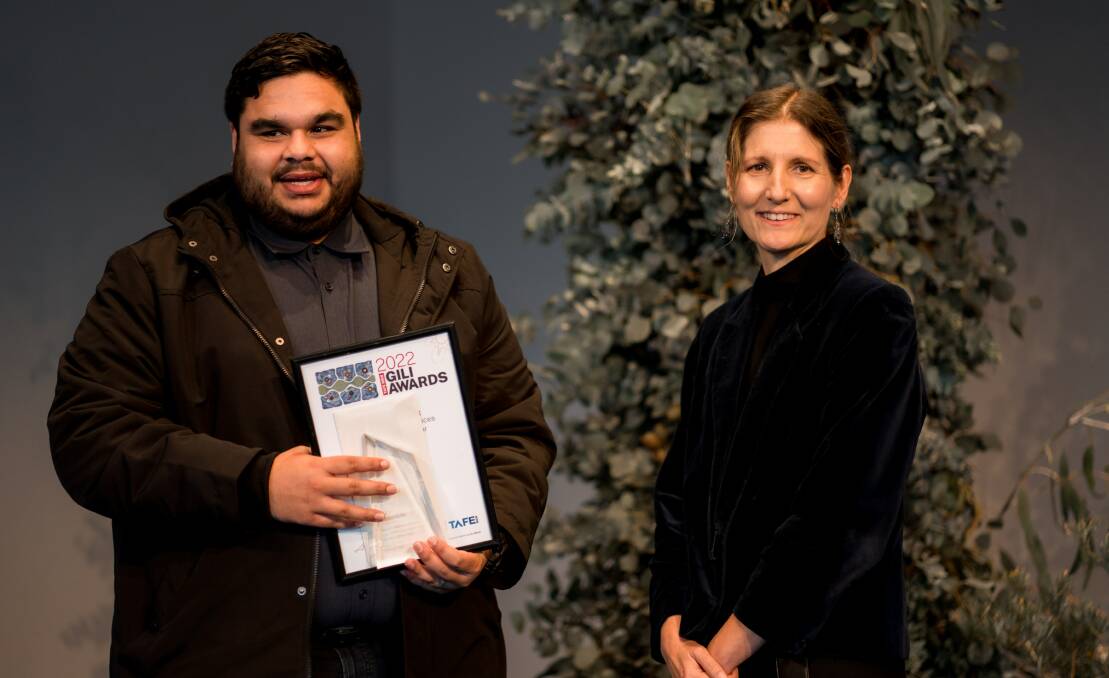  WINNERS ARE GRINNERS: TAFE NSW Young graduate Ash Voll after claiming a prestigious Gili Award recently for the Health, Wellbeing and Community Services Student of the Year, pictured with Susie George from TAFE NSW.