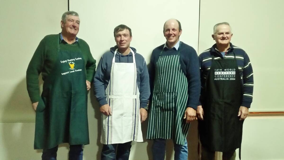 Cootamundra Show Society Committee members Dave Manwaring, Darren Absolon, Geoff Bush and Geoff Larsen getting ready to cook their best chocolate cake.