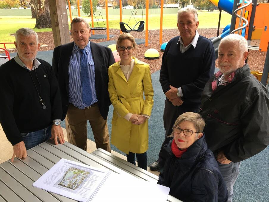  CGRC Manager Waster, Parks & Recreations Services Wayne Bennet with CGRC Mayor Abb McAlister, Member for Cootamundra, Steph Cooke MP, CGRC Deputy Mayor Dennis Palmer and Councillors Charlie Sheahan and Leigh Bowden look over the masterplan for Cootamundra's Jubilee Park. The Park has received $2 million funding from the NSW Public Legacy Program.