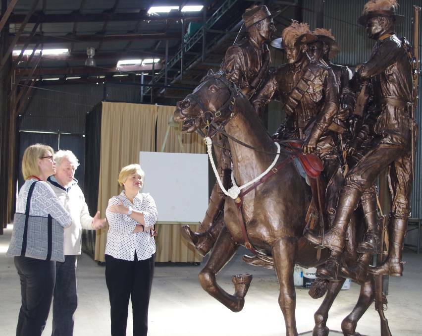 Carl Valerius explains the story behind his sculpture to Katrina Hodgkinson MP and Hilltops Council Administrator, Wendy Tuckerman in 2016.