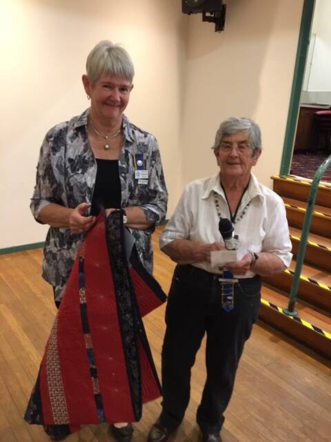 TOP: Patricia Herbert holds the champion piece of handicraft with Ann Pratt.