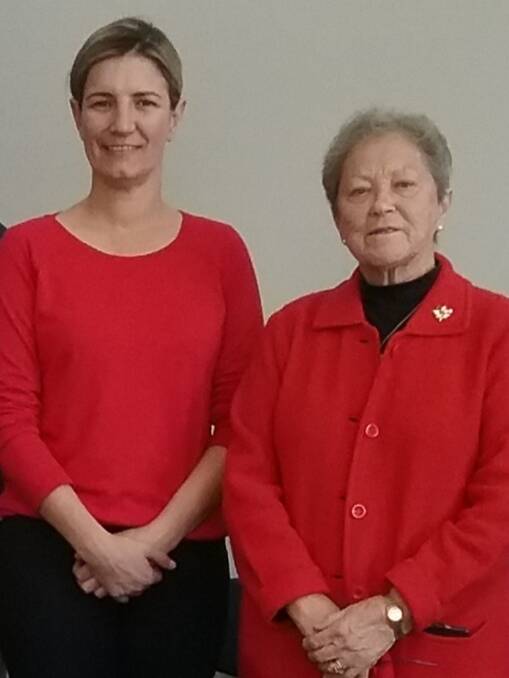RED HOT: Kate Warren, Parkinson's nurse from Wagga, and Helen Eccleston at the recent meeting. Picture: Contributed
