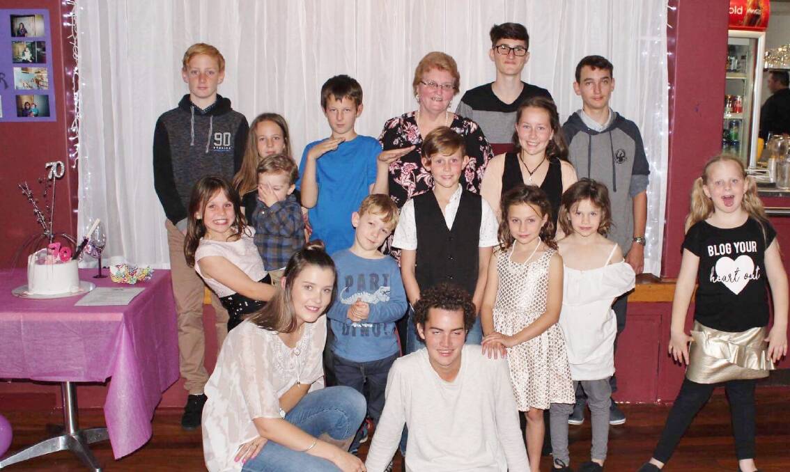 HAPPY MOMENT: Jennifer McAinsh with some of her many grandchildren at her recent 70th birthday celebrations. Picture: Contributed