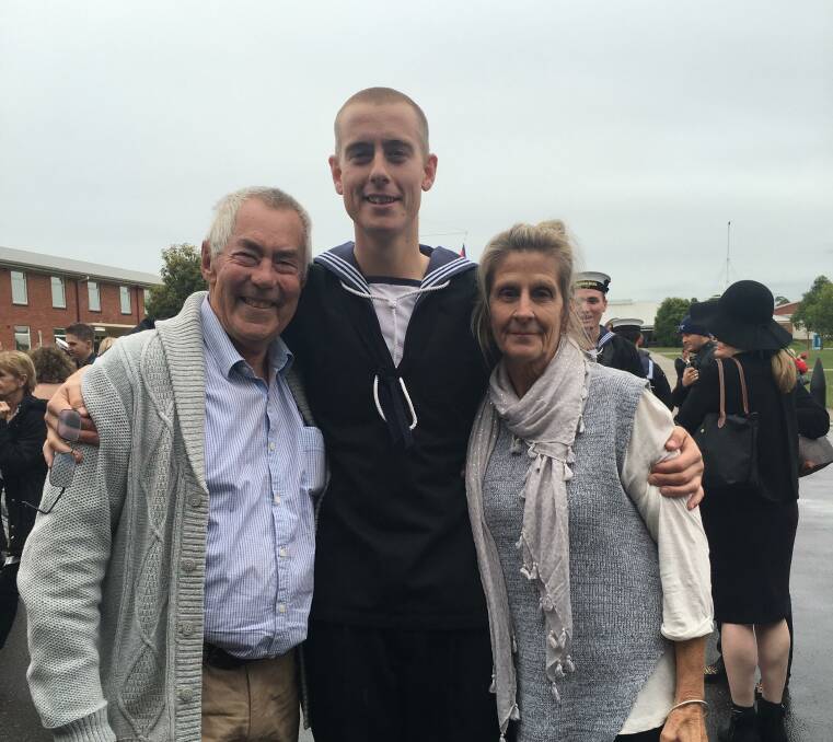 ABLE SEAMAN MARINE: Shaun Montgomery is pictured at his march out last month with his parents Kevin and Denise.