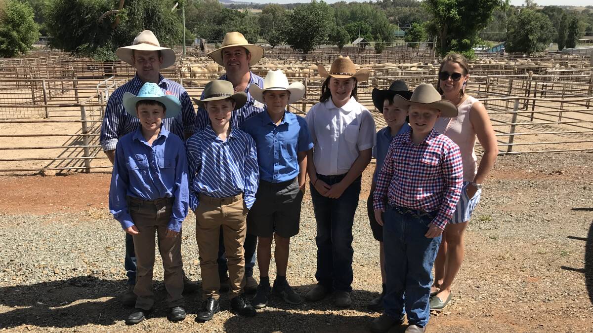 VISIT: Agricultural students from Trinity Catholic School, Harden, had a tour through the saleyards by Lachie Bassingwaithe and Adam Randell of BLM Marketing.