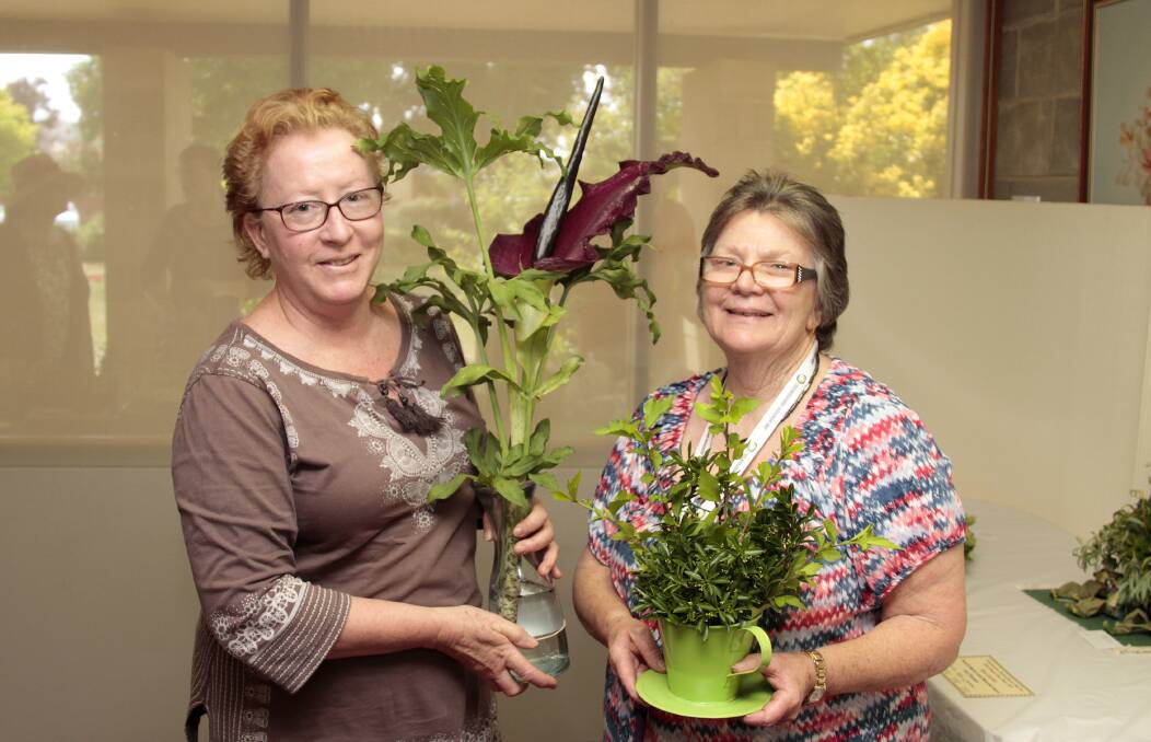 Best Exhibit Frank & Muriel Lewis Memorial Award Cut Flowers, Kay Lander, with her Dracunculus Vulgaris Flower and Marj Smith, first in Floral Art.