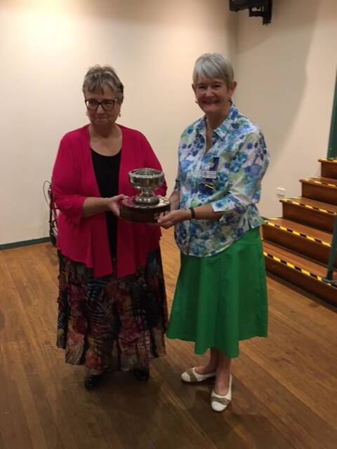Elizabeth Furner presenting the State and Land award to Patricia Herbert, Eurongilly..

