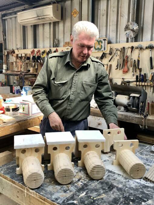 John with some of the trains being crafted. 