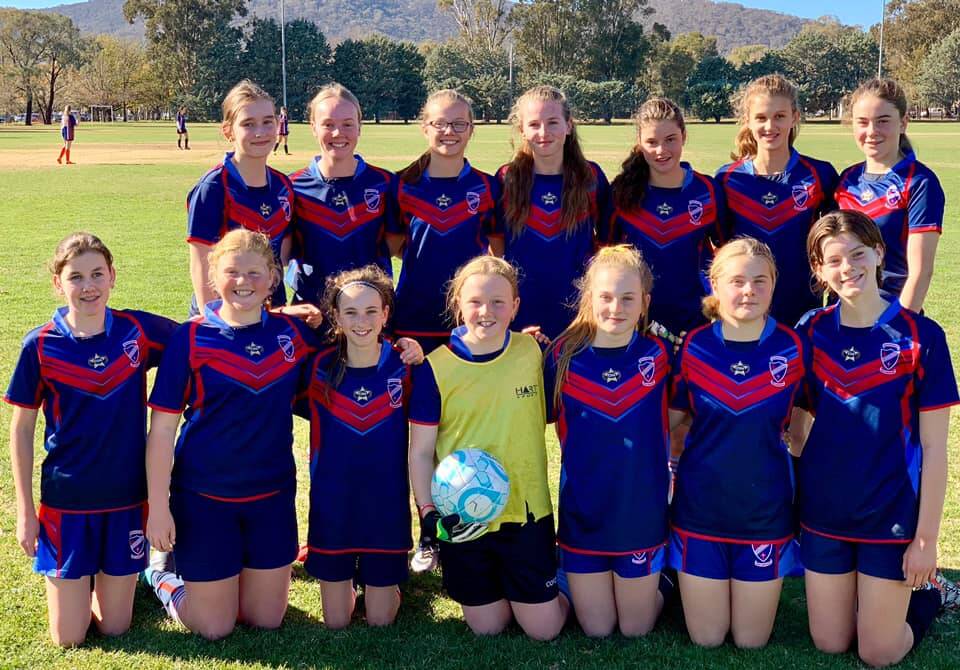 UNDEFEATED: Skill, sportsmanship and teamwork in Canberra last Friday resulted in this group progressing in the Combined Catholic Colleges Soccer Knockout. 