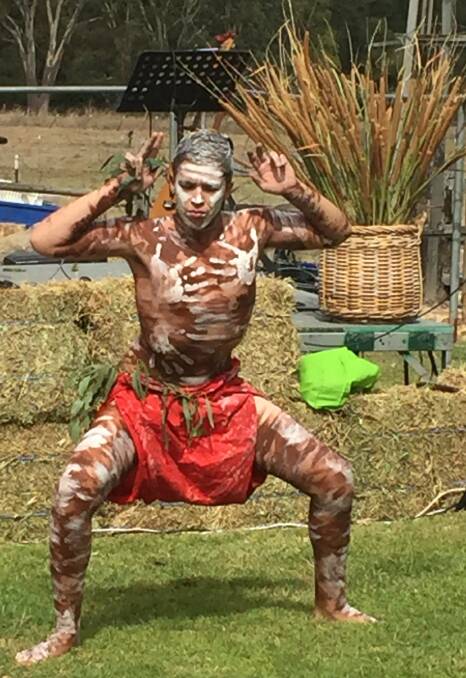 IMPRESSIVE: Koby Russell performs an Aboriginal dance. He involved local school students and children from outside the village in his performance. Picture: Jennette Lees 