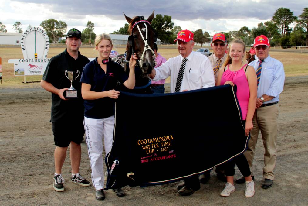 PRESENTATION: Connections of the winner of the Cootamundra Wattle Time Cup 'Parramatta' gather following their race at the Cootamundra Showground on Sunday. Picture: Kelly Manwaring 