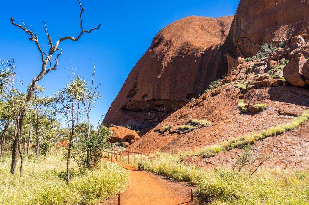 Visitors can feel explore the rock by walking around its base. Picture: Michael Turtle
